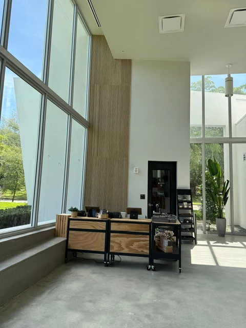 Tall windows and a welcoming seating area in a customer property